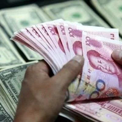 央行“喊话”初见效 人民币兑美元结束十连跌